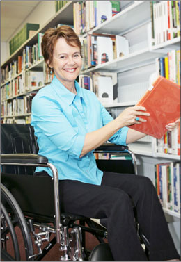 Photograph -- Woman with wheelchair
