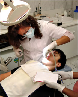 Photograph -- Dentist and child