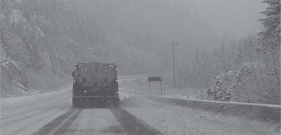 Photograph - Winter maintenance on Sutton Pass.