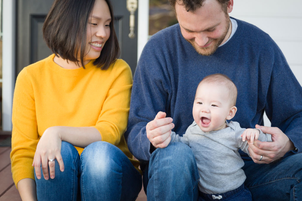 a young couple with toddler