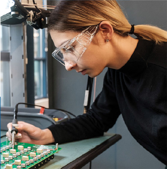 engineer checking a circuit
