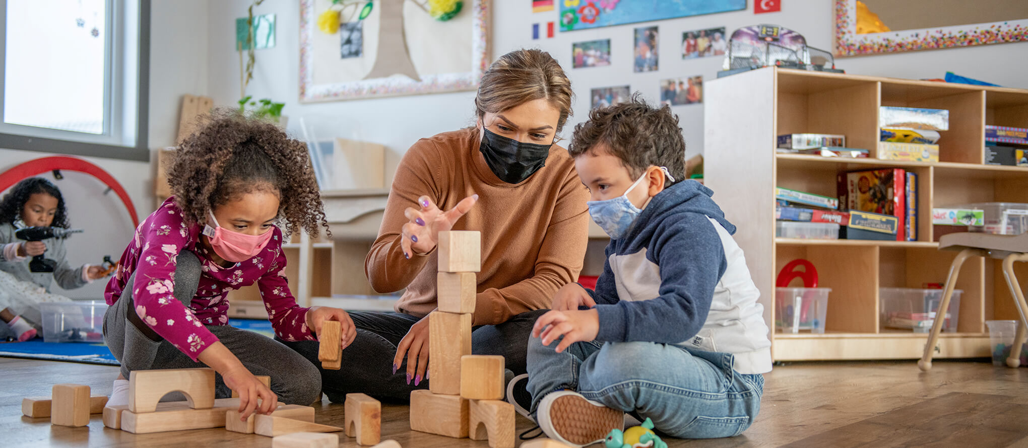 childcare worker with chiildren