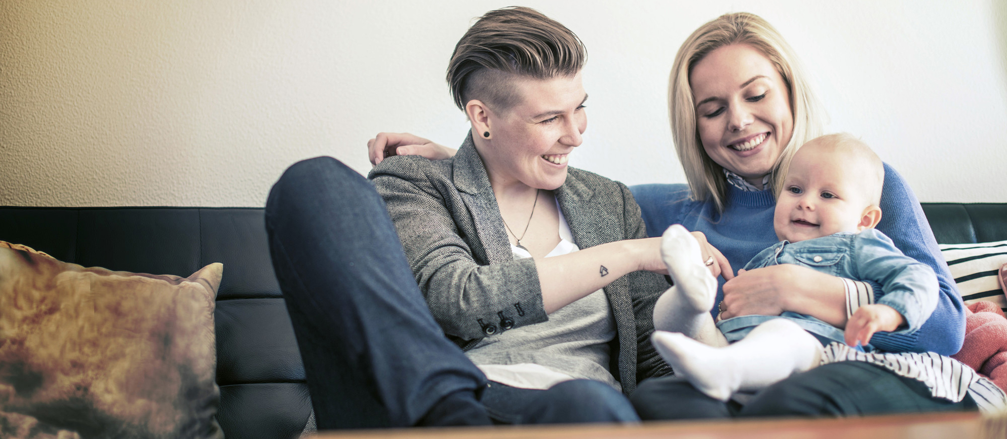 same sex couple with baby