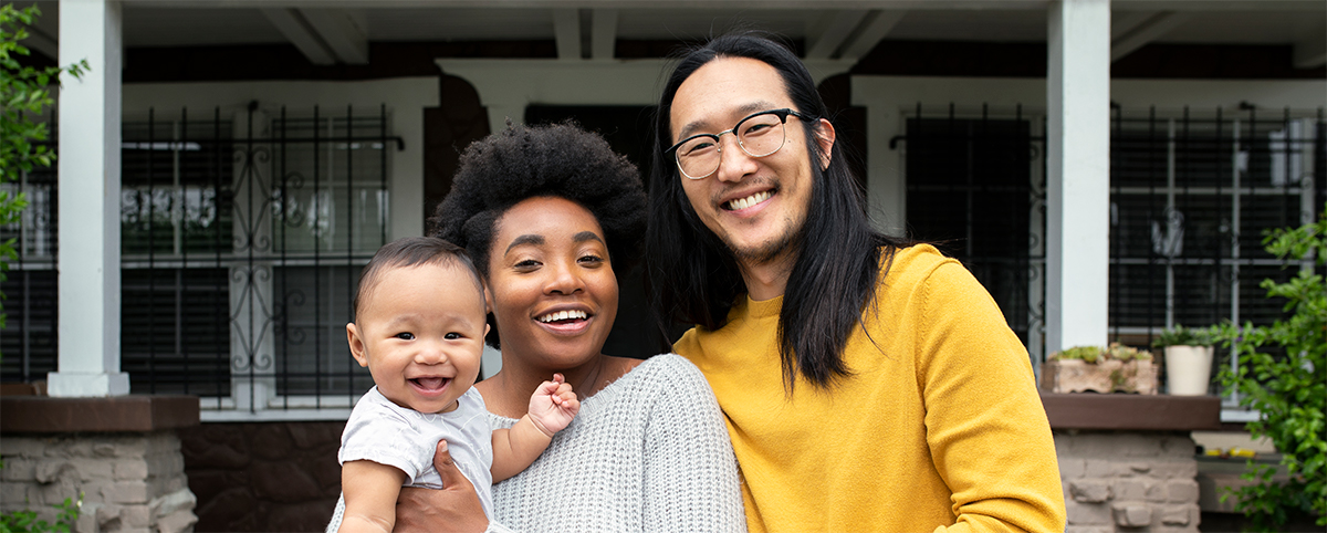 a picture of a young couple with a child