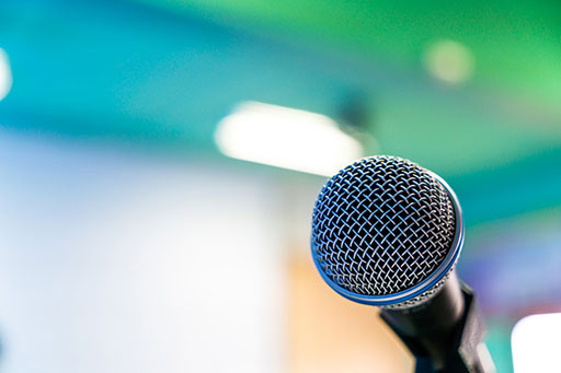 A microphone on a lectern